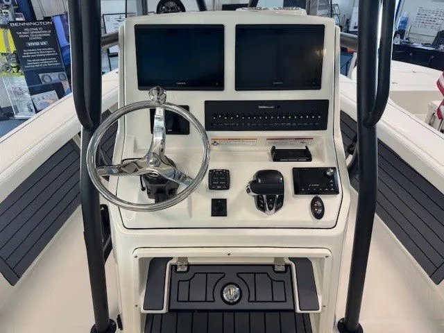 Slide: The Image of Pathfinder 2400 Open 2026 helm with modern instruments. - 28