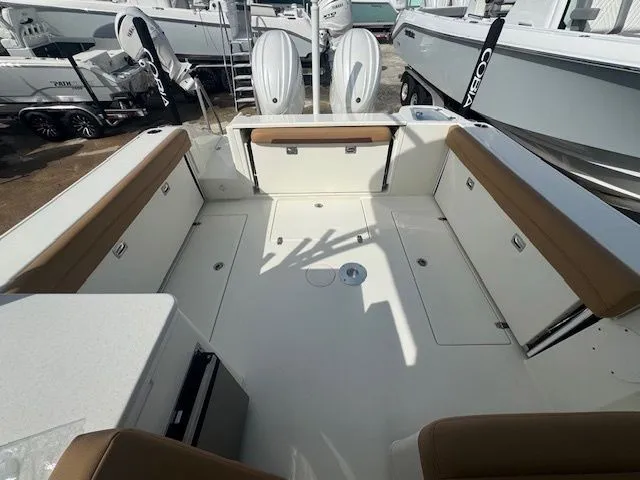 Slide: The Image of Interior view of the 2026 Cobia 280 Dual Console boat. - 27