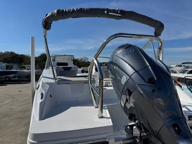 Slide: The Image of 2026 Hurricane SunDeck 2050 OB boat with outboard motor. - 25
