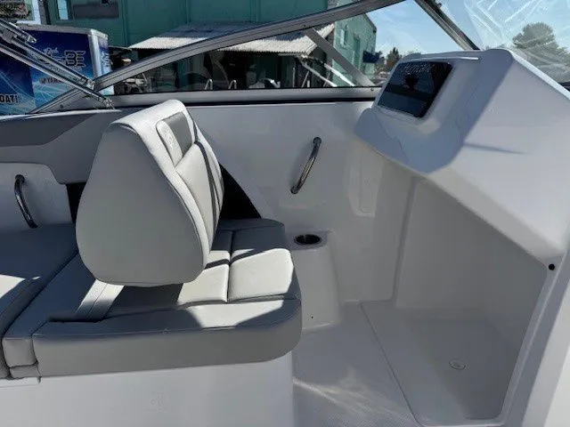 Slide: The Image of Interior of 2026 Hurricane SunDeck 2050 OB with gray seating. - 27