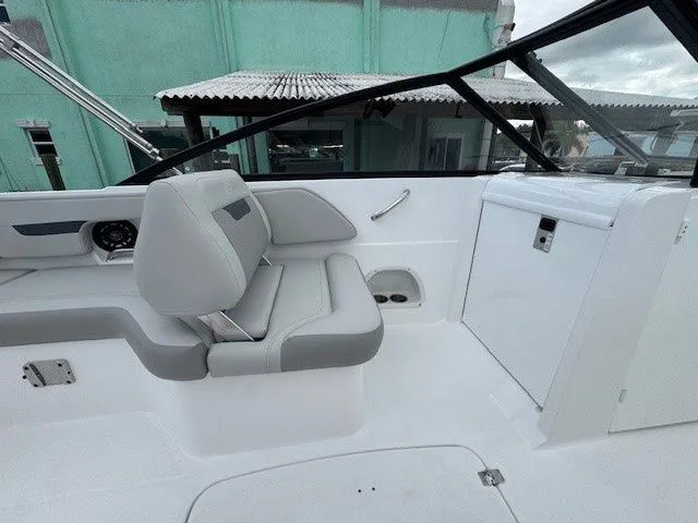 Slide: The Image of Interior of 2026 Hurricane SunDeck 235 OB with gray seating. - 25