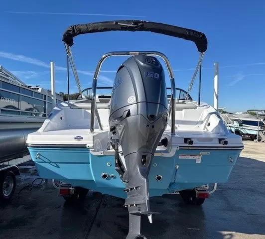 Slide: The Image of 2026 Hurricane SunDeck 2050 OB with outboard motor, blue and white finish. - 20