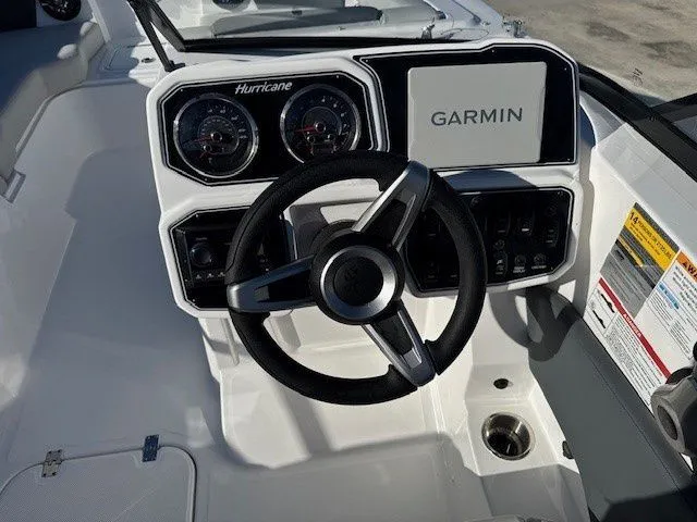 Slide: The Image of 2026 Hurricane SunDeck 2050 OB helm with Garmin display. - 25