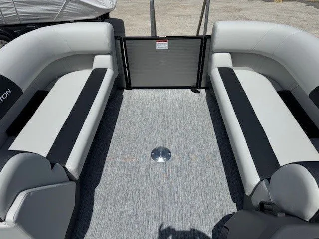 Slide: The Image of Interior of 2026 Bennington 22SSRSE with gray and black seating. - 36