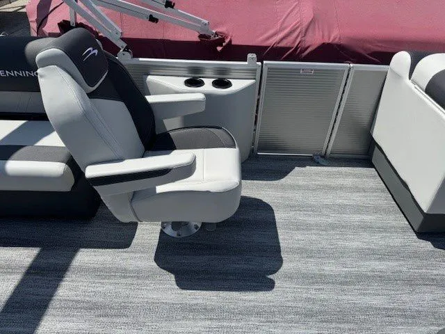 Slide: The Image of Interior of 2026 Bennington 20SSRSE with gray carpet and seating. - 31