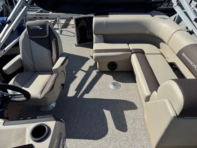 Slide: The Image of Interior of 2026 Bennington 21SL pontoon boat with luxurious seating. - 19