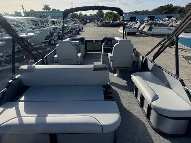 Slide: The Image of Interior view of Sweetwater 2286SFLC pontoon boat, 2026 model, on a boat deck. - 25