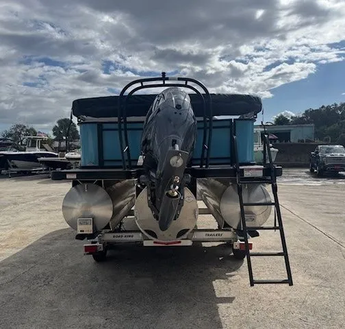 Slide: The Image of Rear view of a 2026 Sweetwater 2286CP pontoon boat on a trailer. - 23