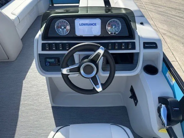 Slide: The Image of Cockpit of Sweetwater 2286CP pontoon boat, model year 2026. - 27