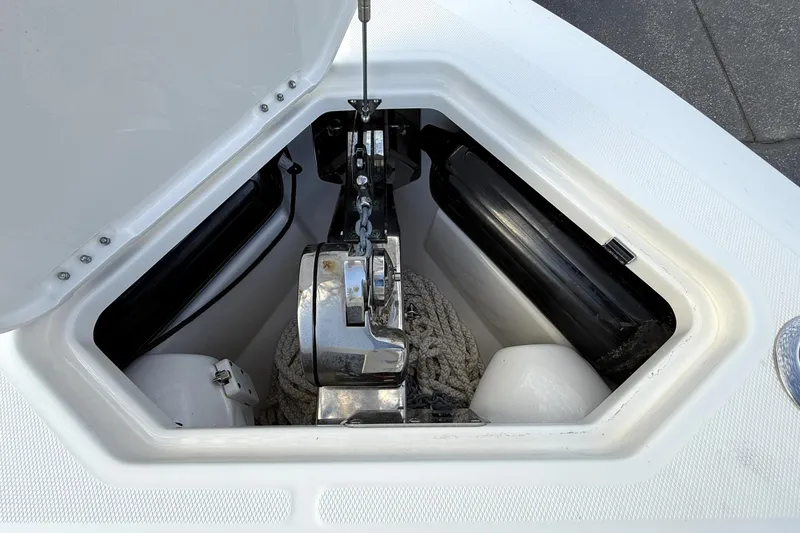 Slide: The Image of Anchor locker of 2023 Solace 30 HCS boat with chain and rope storage. - 11