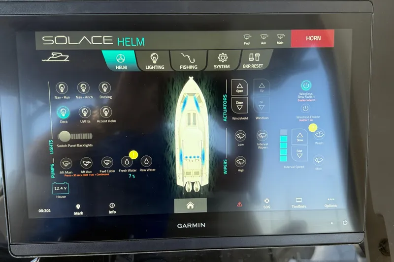 Slide: The Image of Touchscreen display of a 2023 Solace 30 HCS boat control system. - 32