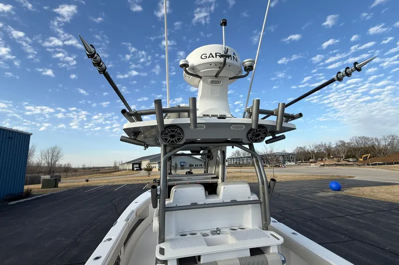 Slide: The Image of 2023 Solace 30 HCS boat with advanced Garmin radar system under a clear sky. - 35