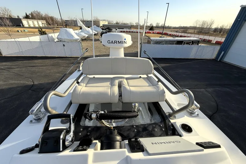 Slide: The Image of 2023 Solace 30 HCS boat with Garmin equipment, docked outdoors. - 41