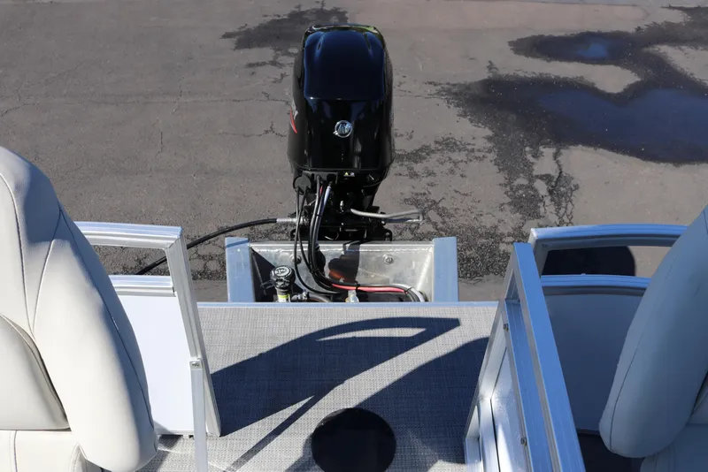 Slide: The Image of 2023 SunChaser Vista 20 Fish boat with outboard motor and seating. - 13