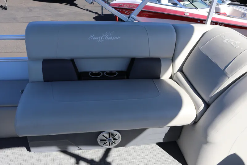 Slide: The Image of 2023 SunChaser Vista 20 Fish boat seating with cup holders and speaker. - 15