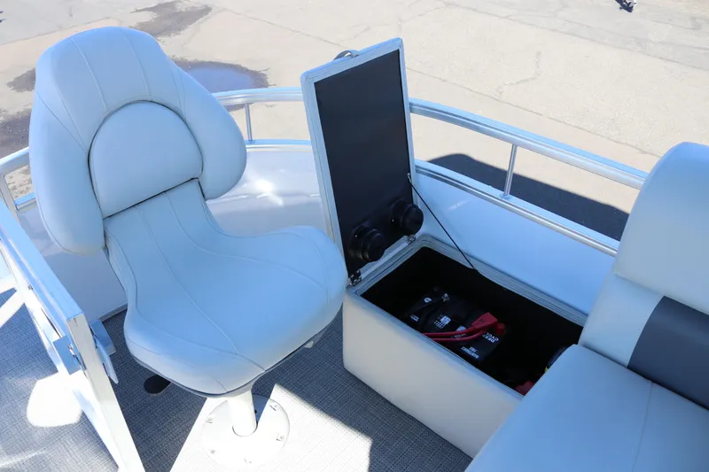 Slide: The Image of 2023 SunChaser Vista 20 Fish boat interior with seating and storage compartment. - 16