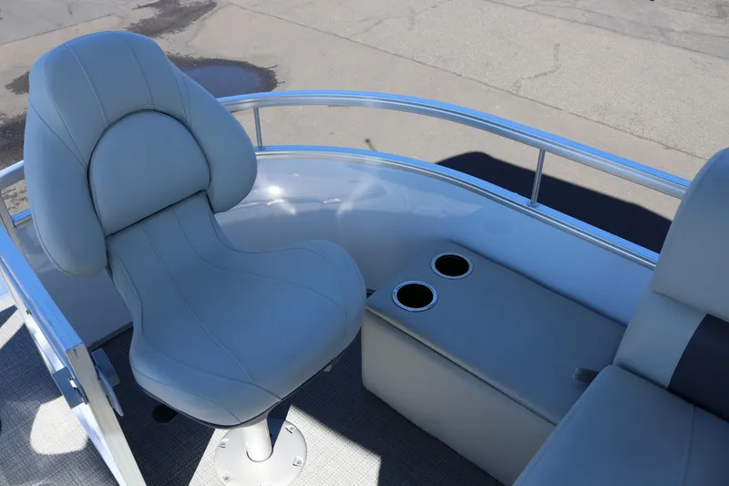 Slide: The Image of 2023 SunChaser Vista 20 Fish boat interior with seating and cup holders. - 17