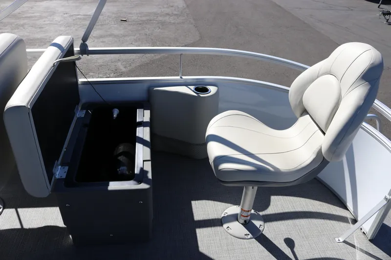 Slide: The Image of 2023 SunChaser Vista 20 Fish boat interior with swivel seat and storage compartment. - 19