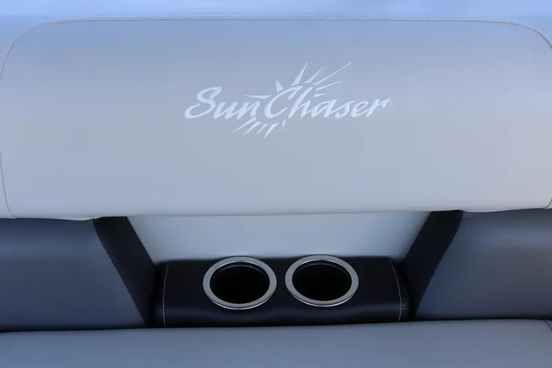 Slide: The Image of SunChaser Vista 20 Fish 2023 boat seat with logo and cup holders. - 23