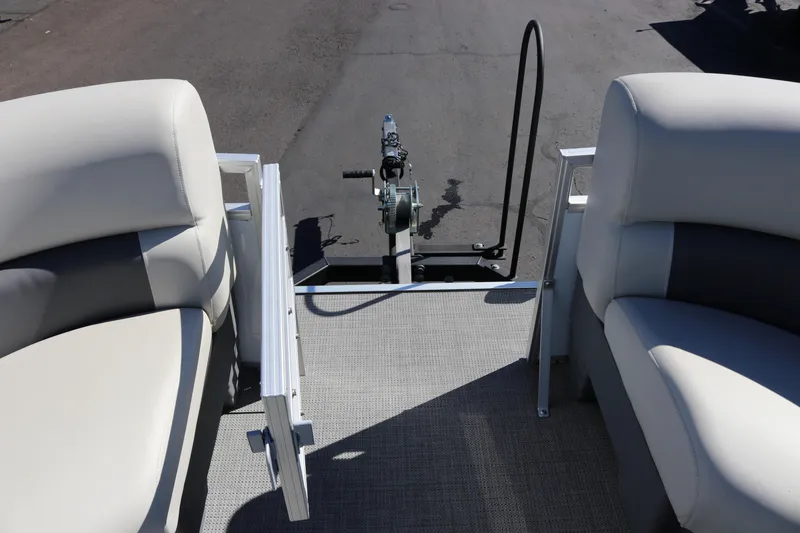 Slide: The Image of 2023 SunChaser Vista 20 Fish pontoon boat interior with seating and deck view. - 35