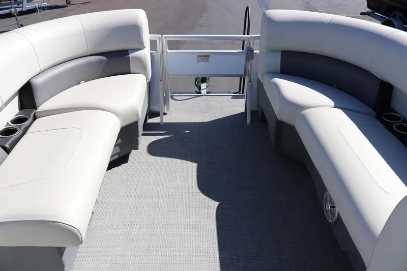 Slide: The Image of 2023 SunChaser Vista 20 Fish pontoon boat interior with cushioned seating and cup holders. - 39