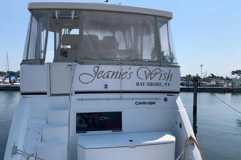 Slide: The Image of Carver 356 Aft Cabin Motor Yacht 2000, named "Jeanie's Wish," docked at Bay Shore, NY. - 13