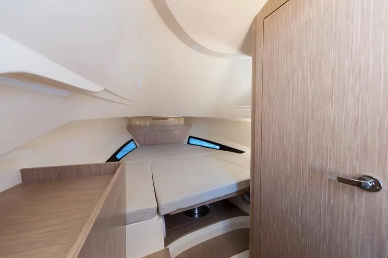 Slide: The Image of Manufacturer Provided Image: Interior of 2025 Nuova Jolly Prince 38 Sport Cabin, featuring a cozy sleeping area. - 3