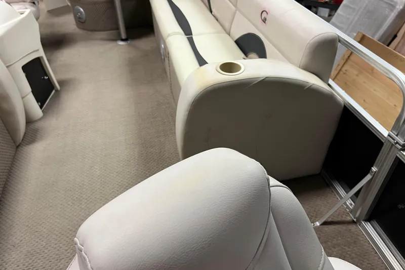 Slide: The Image of Interior of 2014 Avalon Grand Island 2485 QF pontoon boat with beige seating. - 11