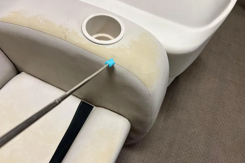 Slide: The Image of 2014 Avalon Grand Island 2485 QF boat seat with cup holder and cleaning tool. - 14