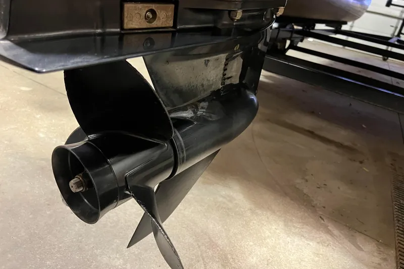 Slide: The Image of Close-up of a 2014 Avalon Grand Island 2485 QF boat propeller in a garage. - 71