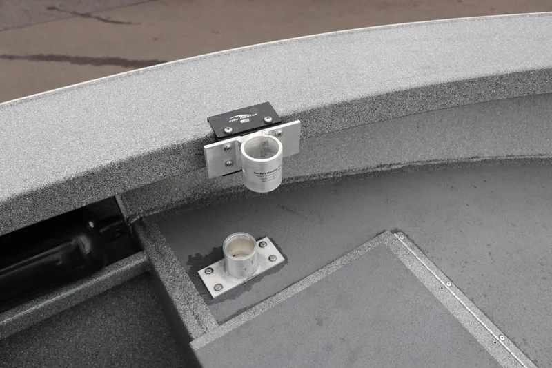 Slide: The Image of 2022 North River Osprey boat interior with rod holder and textured flooring. - 12