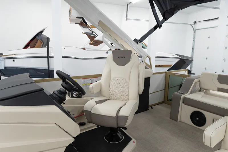 Slide: The Image of Interior of a 2026 Alera M23Q boat with luxurious seating and modern design. - 11