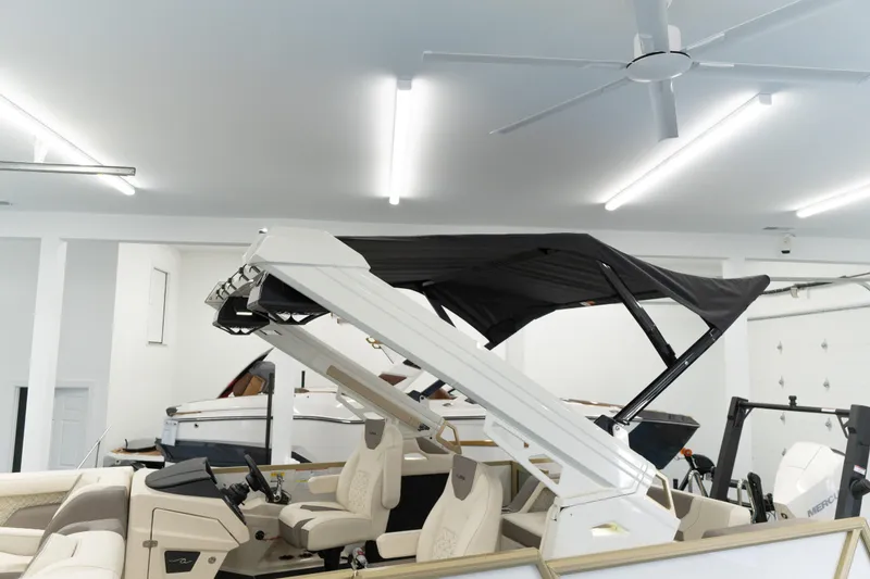 Slide: The Image of Modern Alera M23Q boat in a garage, featuring sleek design and advanced features, 2026 model. - 20