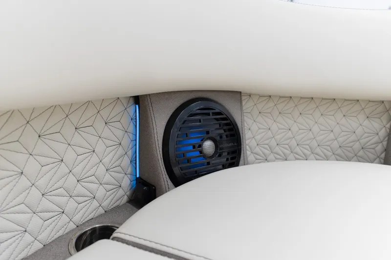 Slide: The Image of Luxurious Alera M23Q 2026 interior with geometric upholstery and integrated speaker system. - 6