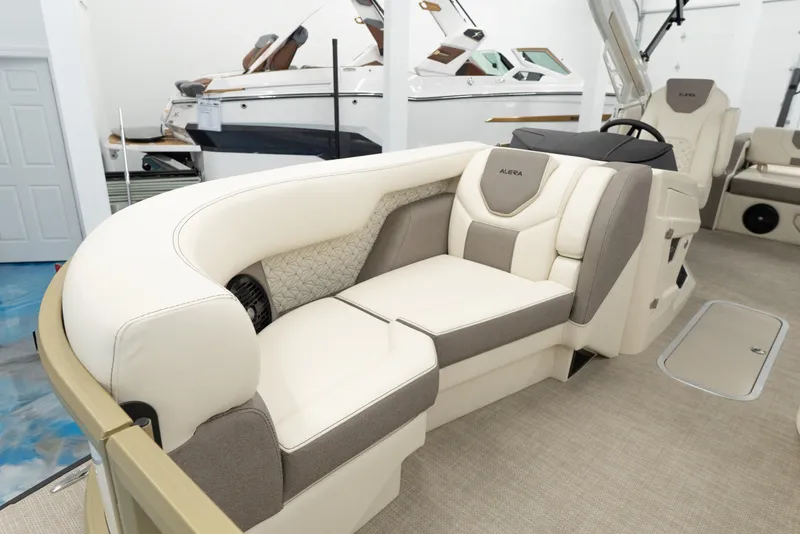 Slide: The Image of Luxurious 2026 Alera M23Q boat interior with plush seating and modern design. - 7