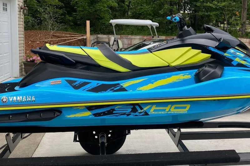 The Image of 2022 Yamaha WaveRunner GP1800R SVHO in vibrant blue and yellow design. - 0