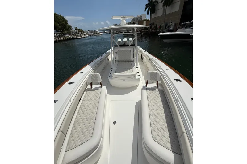 Slide: The Image of 2024 Valhalla Boatworks V-37 luxury boat interior with elegant seating and sleek design. - 15