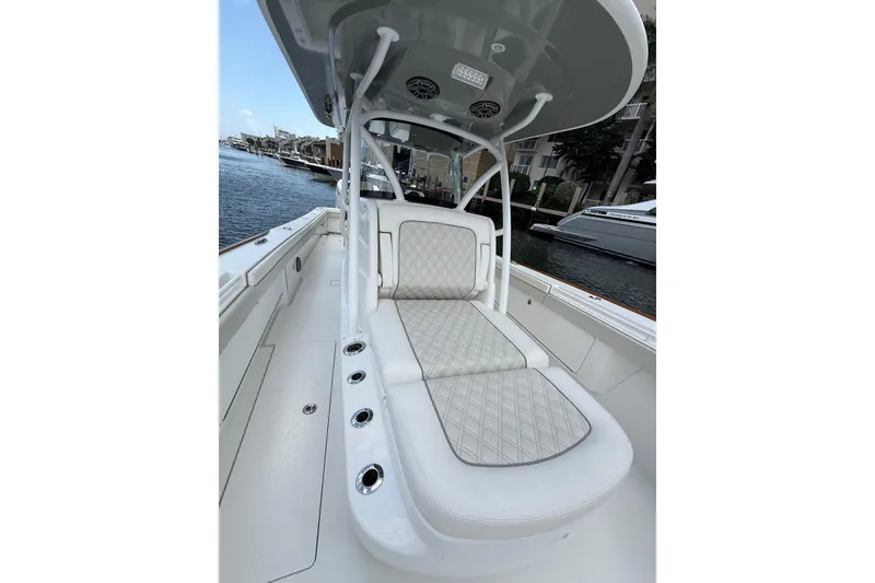 Slide: The Image of 2024 Valhalla Boatworks V-37 interior with cushioned seating and sleek design. - 12