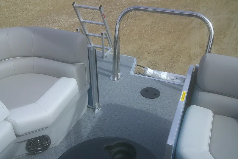 Slide: The Image of 2026 Godfrey EX 2286 SBX pontoon boat interior with seating and ladder. - 14