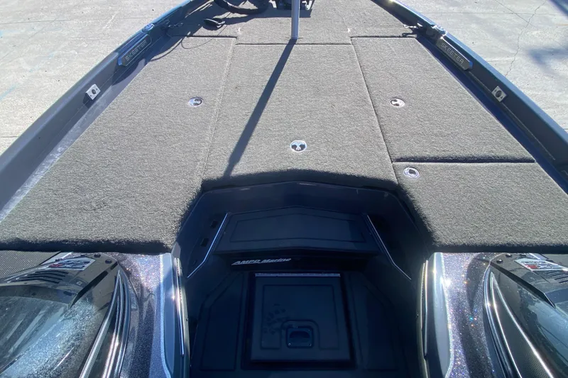 Slide: The Image of 2020 Skeeter FXR20 Limited boat deck with carpeted storage compartments. - 17