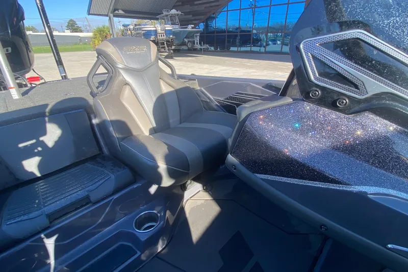 Slide: The Image of 2020 Skeeter FXR20 Limited boat interior with sleek seating and glittering dashboard. - 18