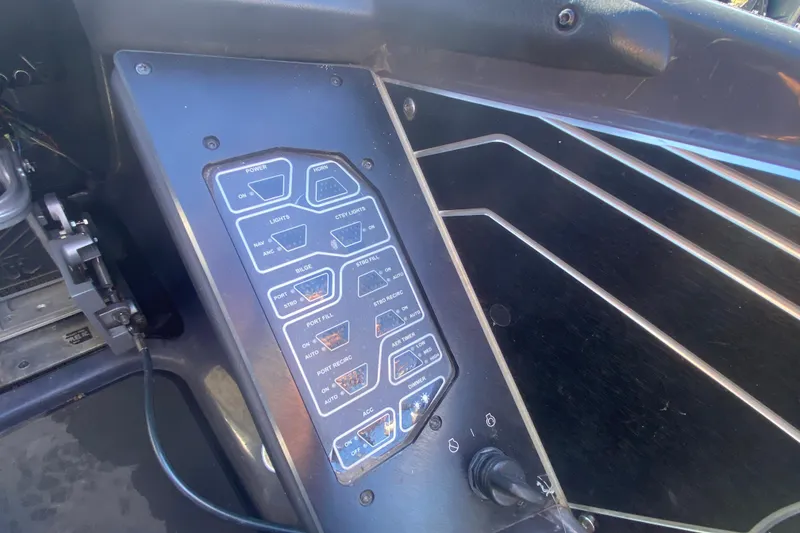 Slide: The Image of Control panel of a 2020 Skeeter FXR20 Limited boat with labeled switches. - 20