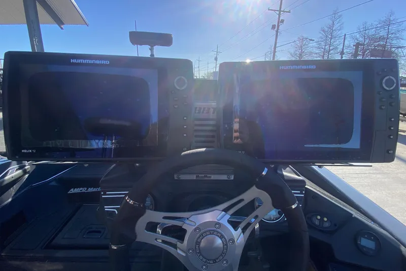 Slide: The Image of 2020 Skeeter FXR20 Limited boat dashboard with dual Humminbird Helix 12 displays. - 21