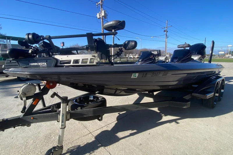Slide: The Image of 2020 Skeeter FXR20 Limited boat with Minn Kota Ultrex motor on trailer. - 8