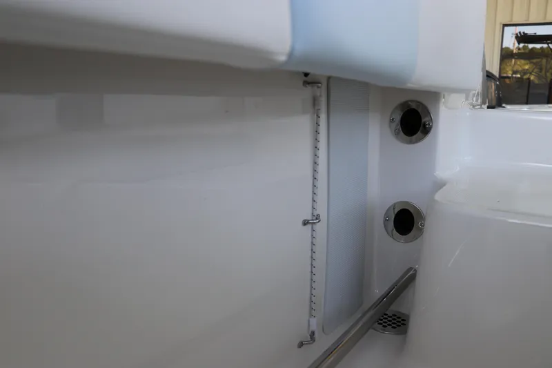 Slide: The Image of Interior detail of 2026 Robalo R202 Explorer boat, featuring sleek design elements. - 7