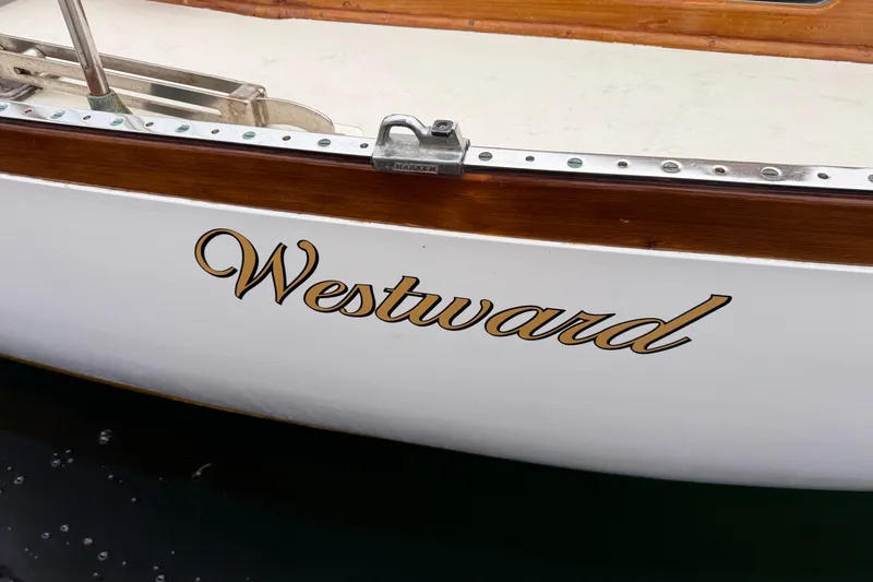 Slide: The Image of 1962 Lapworth Sloop named "Westward" with elegant wooden trim. - 36