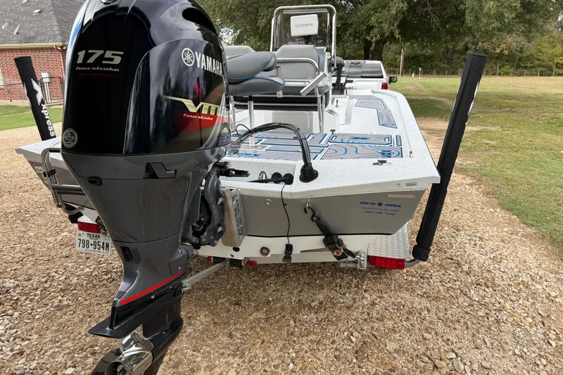 Slide: The Image of 2023 Xpress H22B Bay boat with Yamaha 175 engine on a trailer. - 3