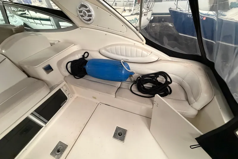 Slide: The Image of Interior of 2001 Maxum 3300 SCR boat with seating and marine equipment. - 16