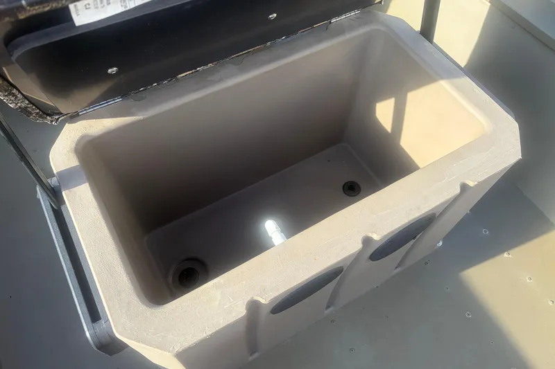 Slide: The Image of Open storage compartment in 2026 G3 Gator Tough Tunnel Jon 18 CCJ boat. - 10