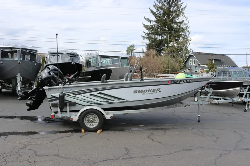 The Image of 2021 Smoker Craft 16 Lodge boat on trailer, parked outdoors. - 0